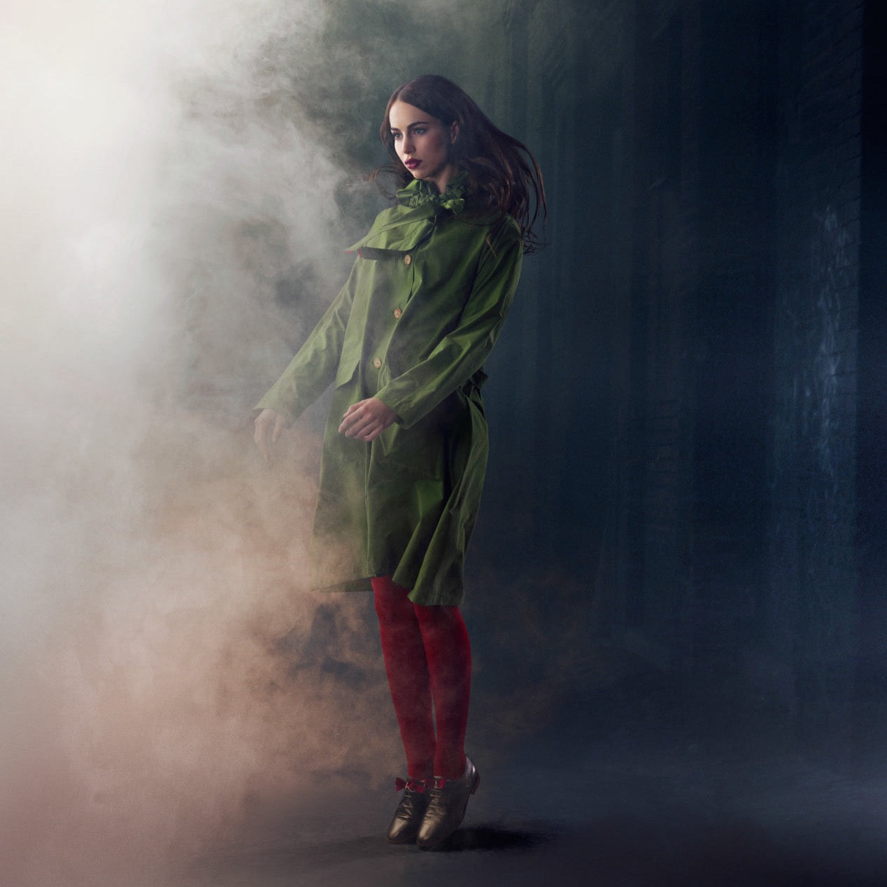 The classic raincoat - green color - on model