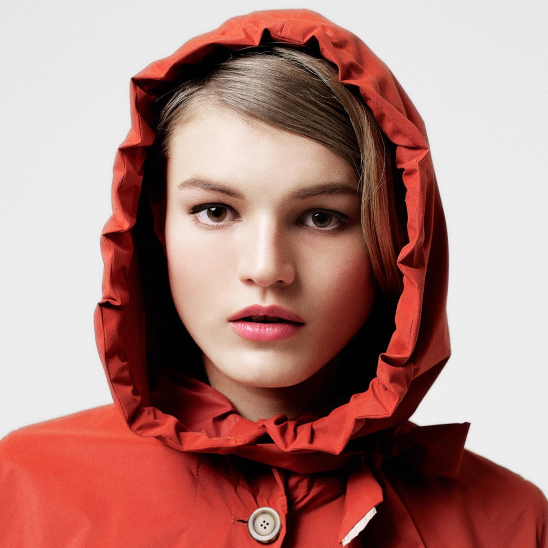 The classic raincoat - orange color - on model