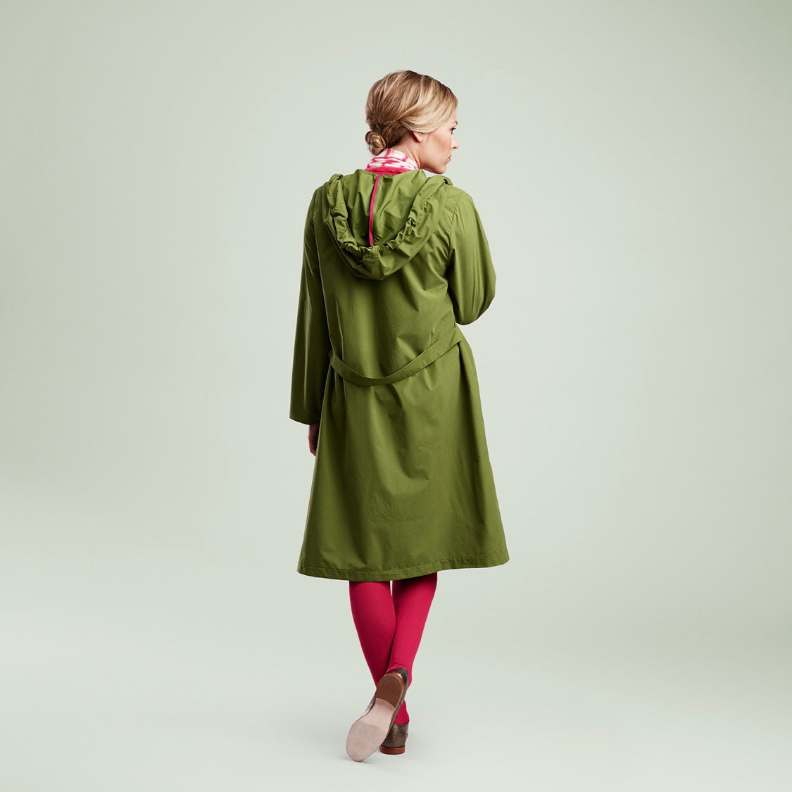 The classic raincoat - green color - on model
