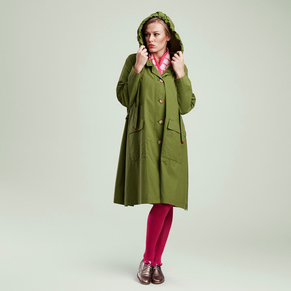The classic raincoat - green color - on model