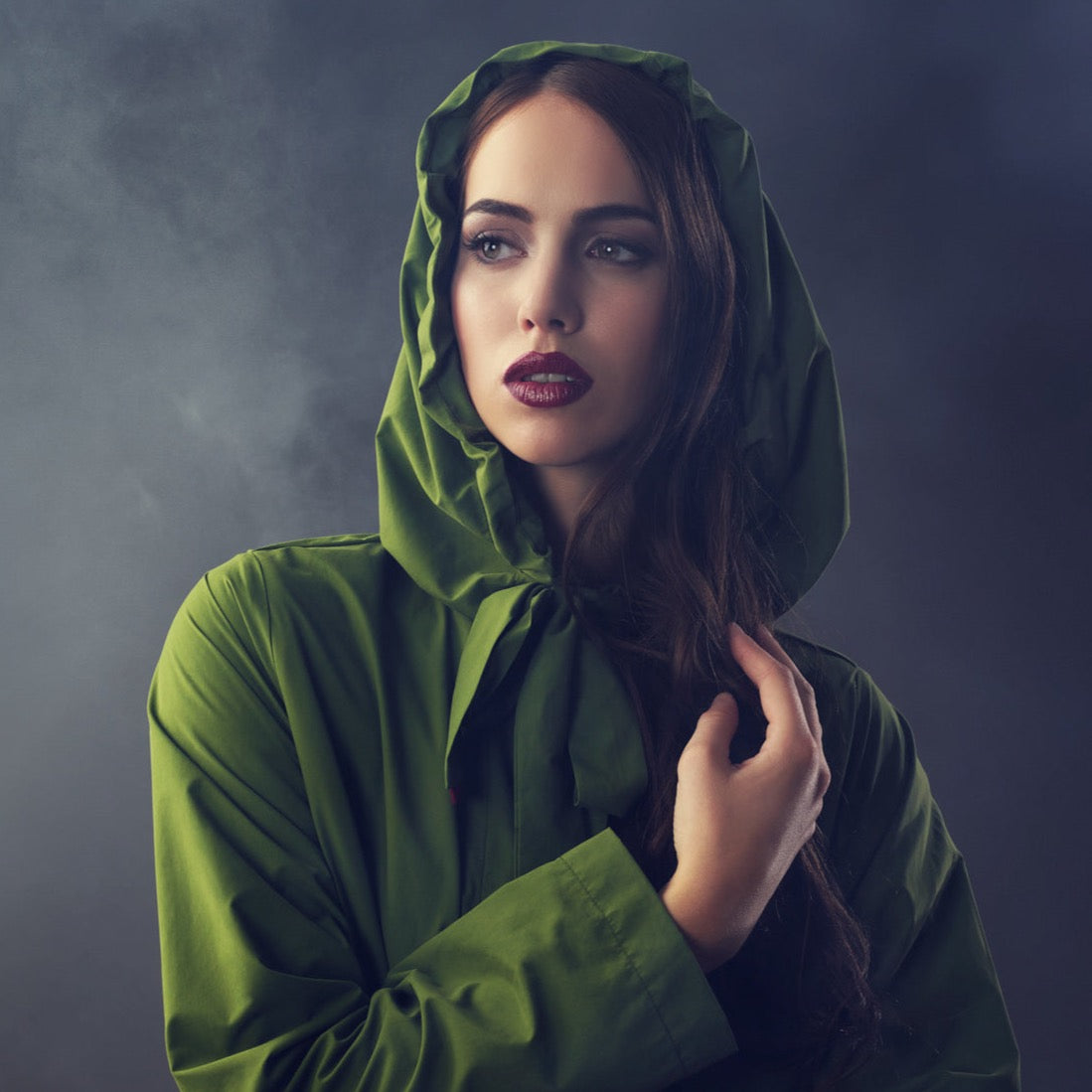 The classic raincoat - green color - on model